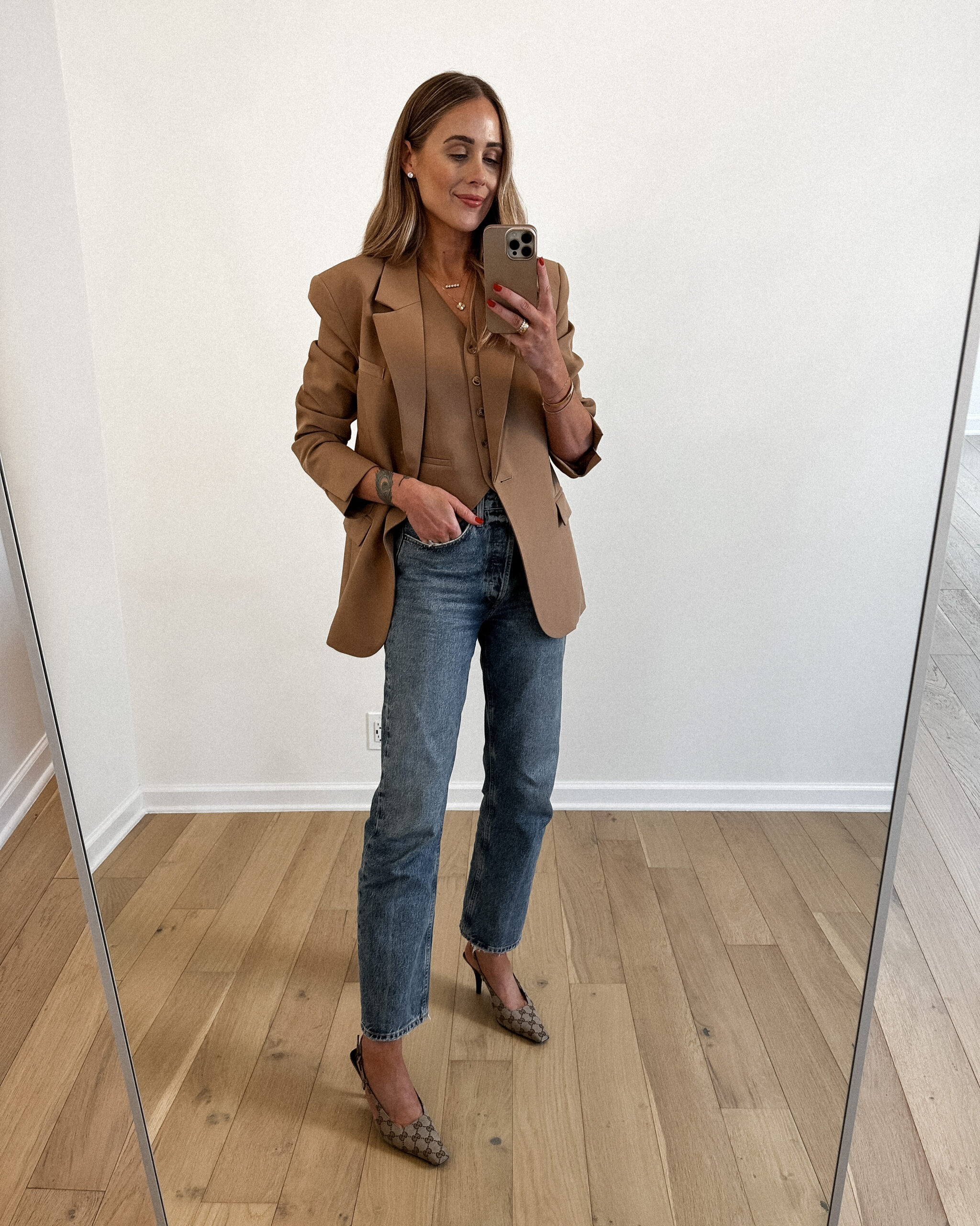 Fashion Jackson Wearing MAYSON the label Camel Boyfriend Blazer, Camel Vest, AGOLDE Denim Jeans, Gucci Logo Slingbacks, Business Casual Workwear Outfit, Smart Casual Fall Outfit Idea