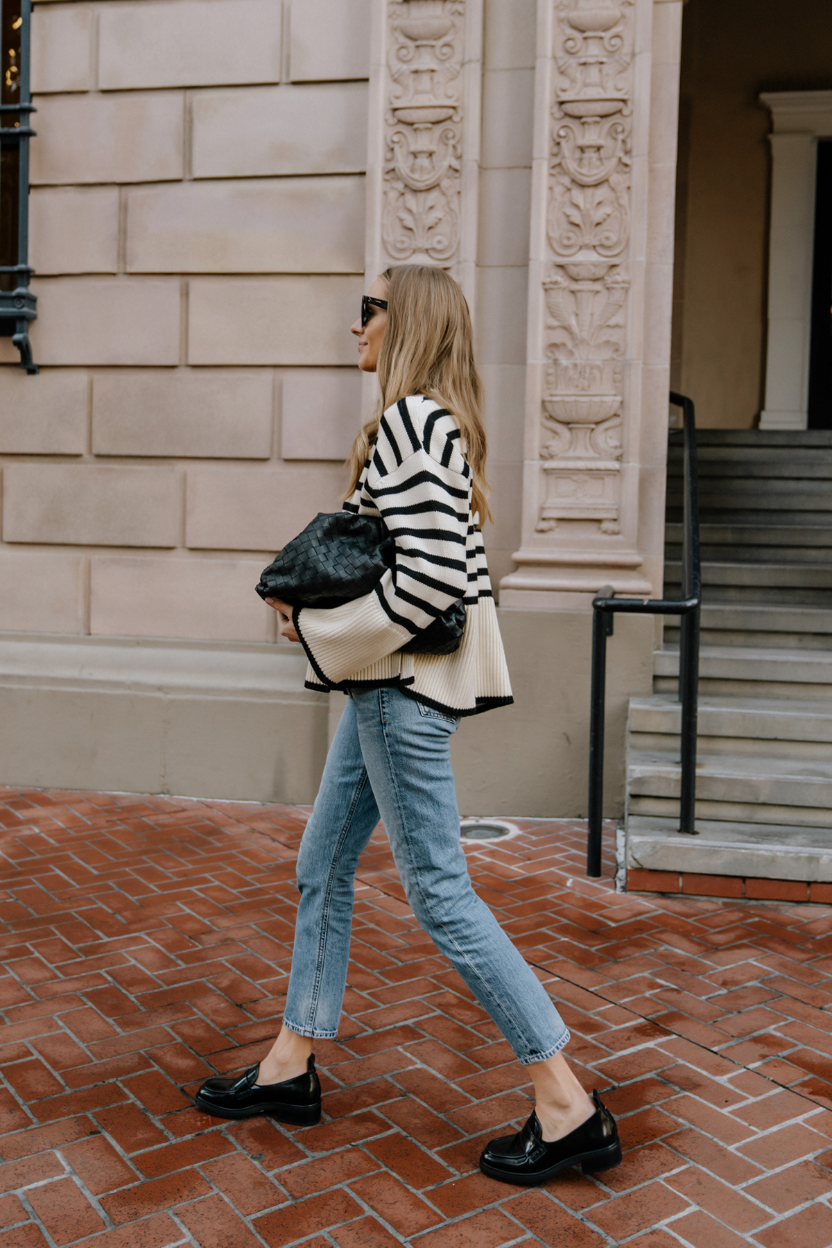 Fashion Jackson Wearing Toteme Striped Oversized Sweater Outfits Black Loafer Outfit AGOLDE Jeans Bottega Veneta Pouch Black Street Style Toteme Signature Striped Sweater Review Fashion Jackson Wearing Toteme Striped Oversized Sweater Outfits Black Loafer Outfit AGOLDE Jeans Bottega Veneta Pouch Black Street Style Toteme Signature Striped Sweater Review