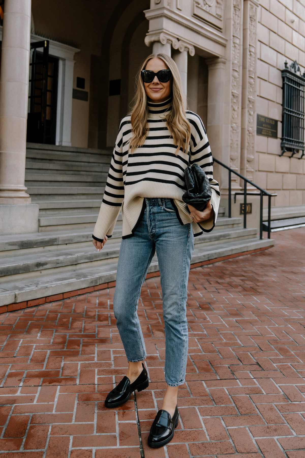 Fashion Jackson Wearing Toteme Striped Oversized Sweater Outfits Black Loafer Outfit AGOLDE Jeans Bottega Veneta Pouch Black Street Style Toteme Signature Striped Sweater Review Fashion Jackson Wearing Toteme Striped Oversized Sweater Outfits Black Loafer Outfit AGOLDE Jeans Bottega Veneta Pouch Black Street Style Toteme Signature Striped Sweater Review