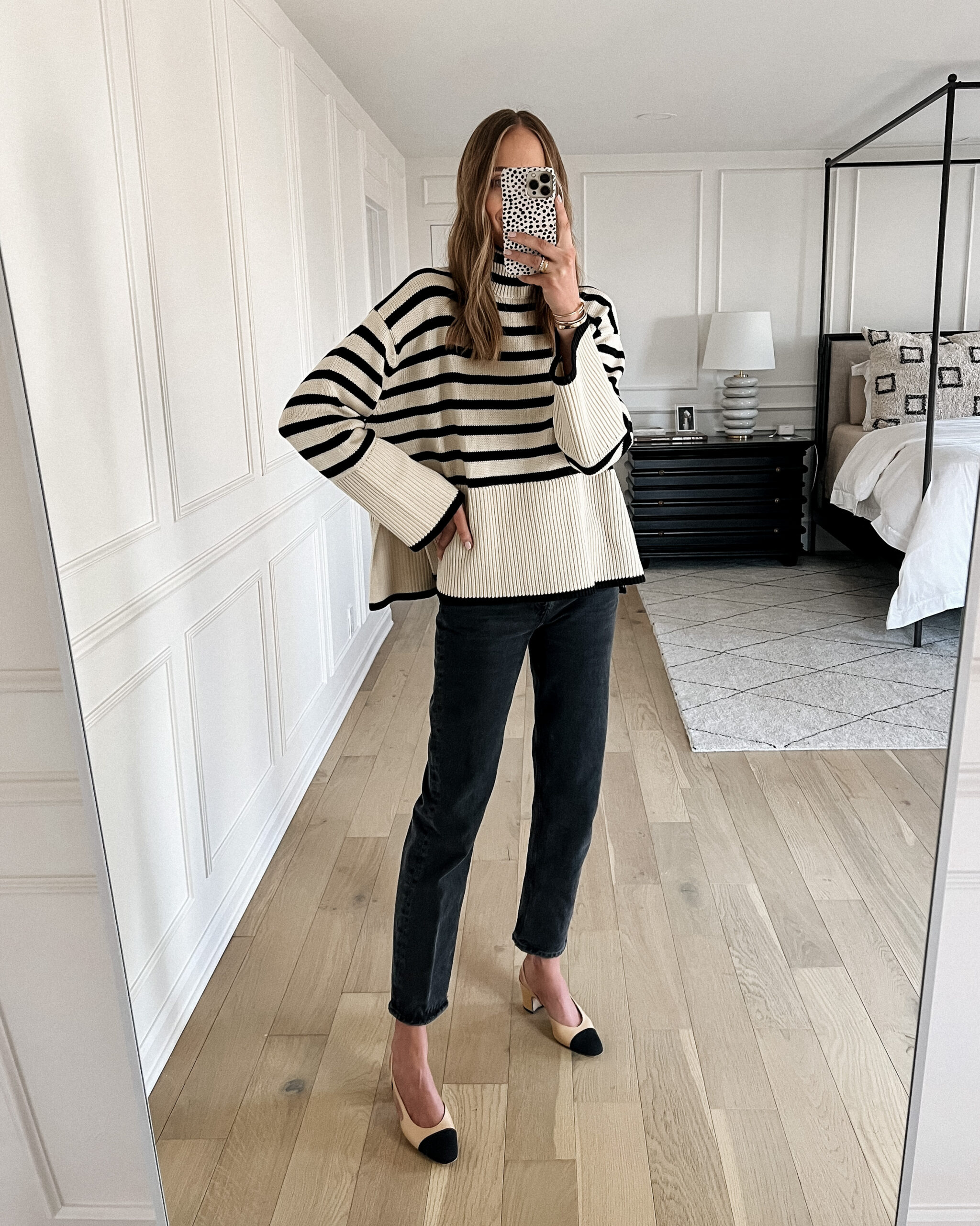 Fashion Jackson Wearing Toteme Signature Stripe Turtleneck Sweater AGOLDE Black Jeans Chanel Slingbacks Fall Outfit Fashion Jackson Wearing Toteme Signature Stripe Turtleneck Sweater AGOLDE Black Jeans Chanel Slingbacks Fall Outfit